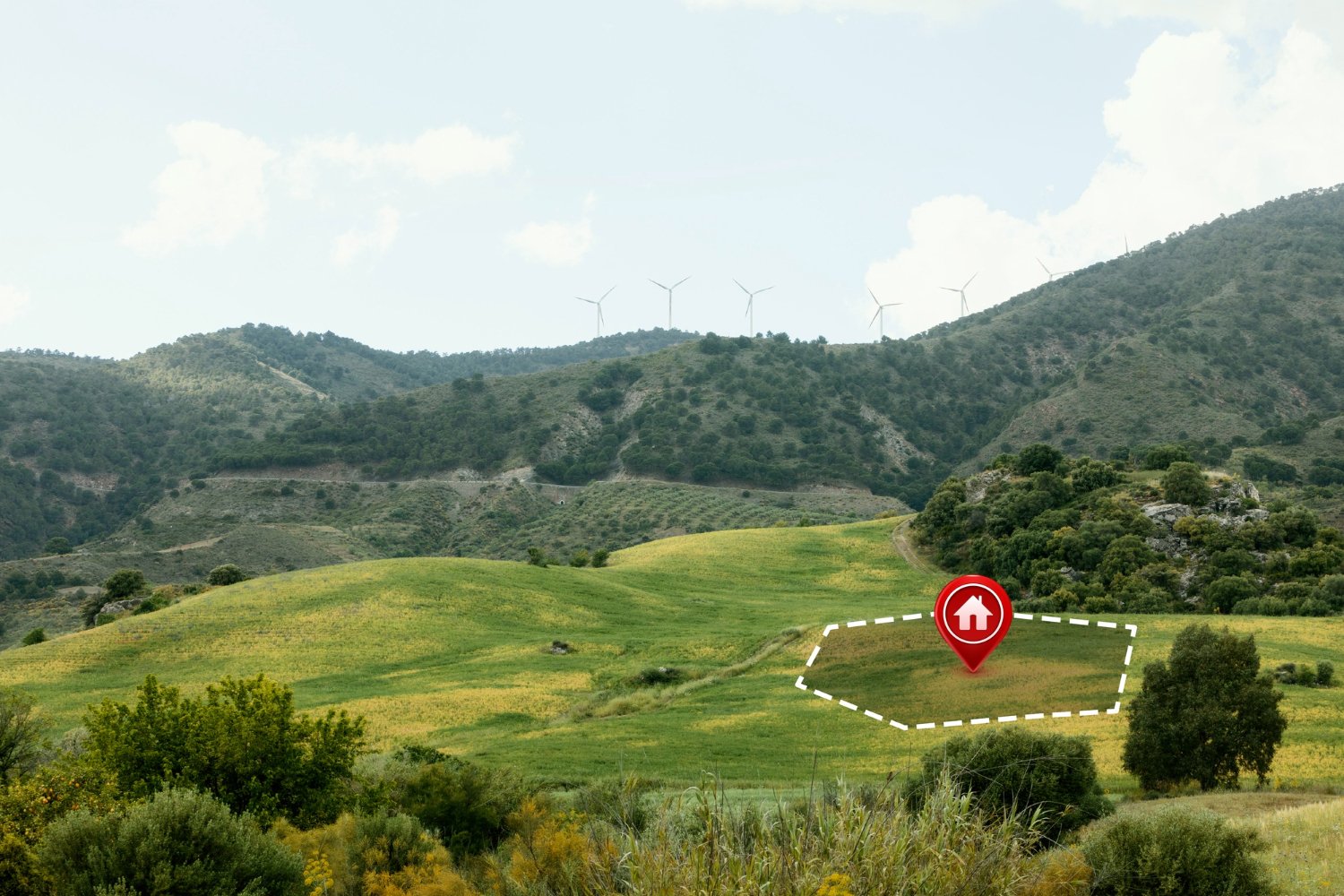 Imagem de um terreno grande e verde com pontilhados indicando um possível lote.